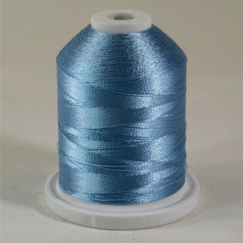 A Sky Blue colored 1100 yd mini king spool of Robison-Anton 40wt Rayon that is vivid, high luster and super-smooth in appearance.