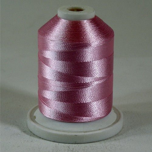 An Light Pink colored 1100 yd mini king spool of Robison-Anton 40wt Rayon that is vivid, high luster and super-smooth in appearance.