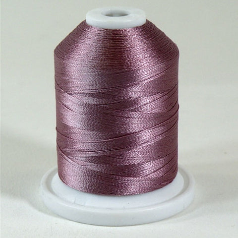 A Satin Wine colored 1100 yd mini king spool of Robison-Anton 40wt Rayon that is vivid, high luster and super-smooth in appearance.
