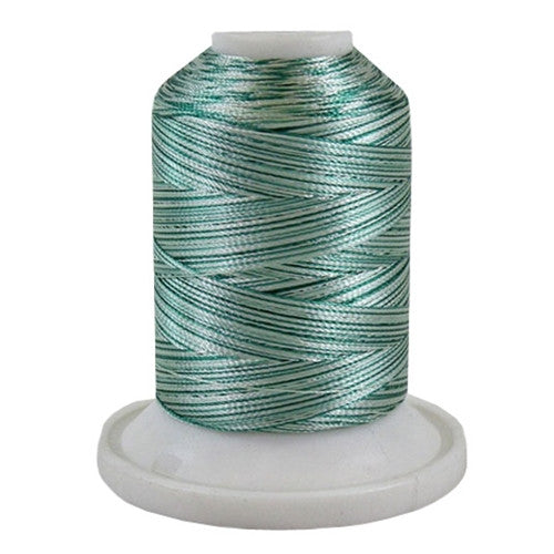 A 3CC Green variegated 700 yd mini king spool of Robison-Anton 40wt Rayon that is vivid, high luster and super-smooth in appearance.
