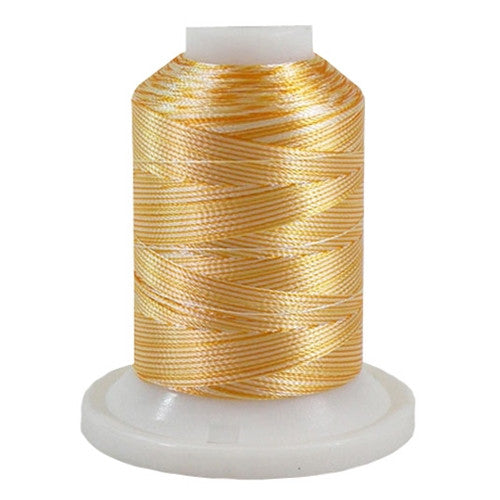 A 3CC Yellow variegated 700 yd mini king spool of Robison-Anton 40wt Rayon that is vivid, high luster and super-smooth in appearance.