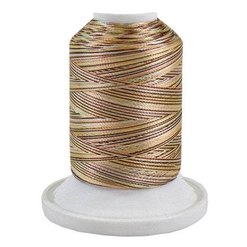 A 4CC Fiesta brown, yellow, orange, & white variegated 700 yd mini king spool of Robison-Anton 40wt Rayon that is vivid, high luster and super-smooth in appearance.