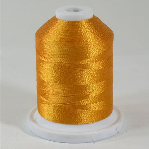 A Mango orange colored 1100 yd mini king spool of Robison-Anton 40wt Rayon that is vivid, high luster and super-smooth in appearance.
