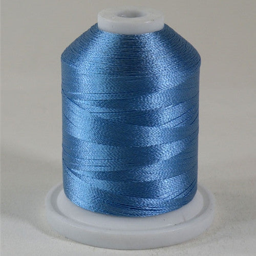 An Ultra Blue colored 1100 yd mini king spool of Robison-Anton 40wt Rayon that is vivid, high luster and super-smooth in appearance.