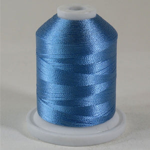 An Ultra Blue colored 1100 yd mini king spool of Robison-Anton 40wt Rayon that is vivid, high luster and super-smooth in appearance.